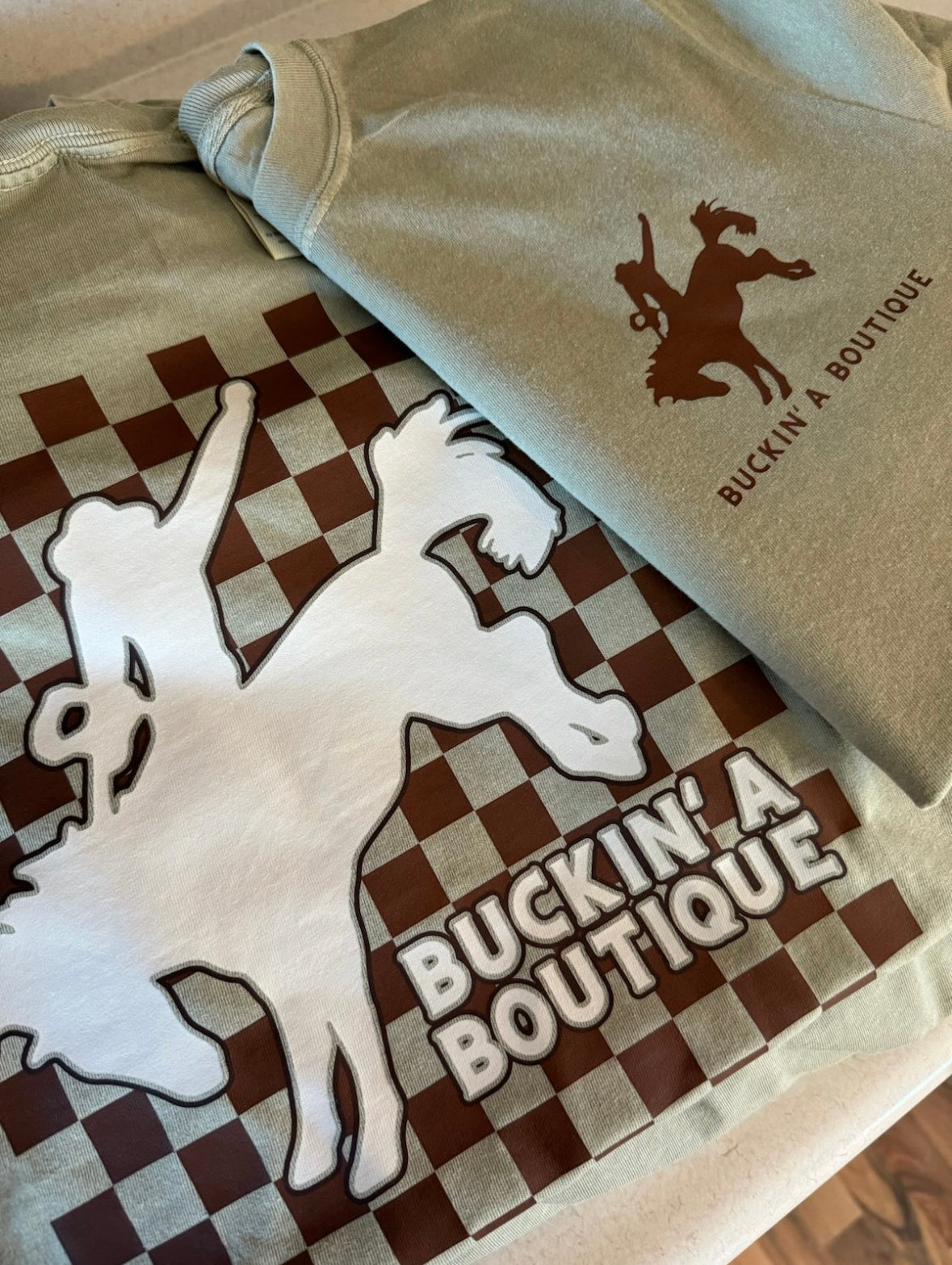 Buckin’ A Boutique Brand Tee