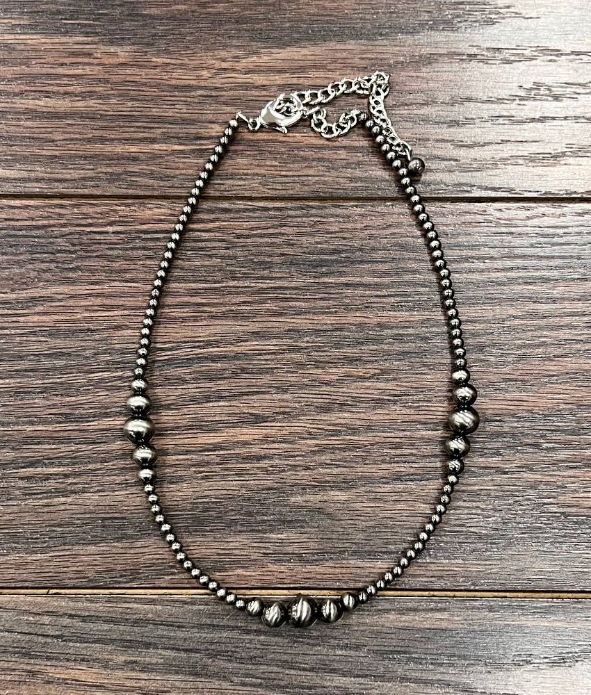 Multiple Clustered Dark Polish Navajo Necklace