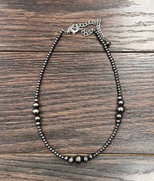 Multiple Clustered Dark Polish Navajo Necklace